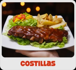 $38.000 | En salsa BBQ o BBQ Mora, acompañadas de papas, ensalada de lechuga, tomate y mango, todo con salsas de la casa.