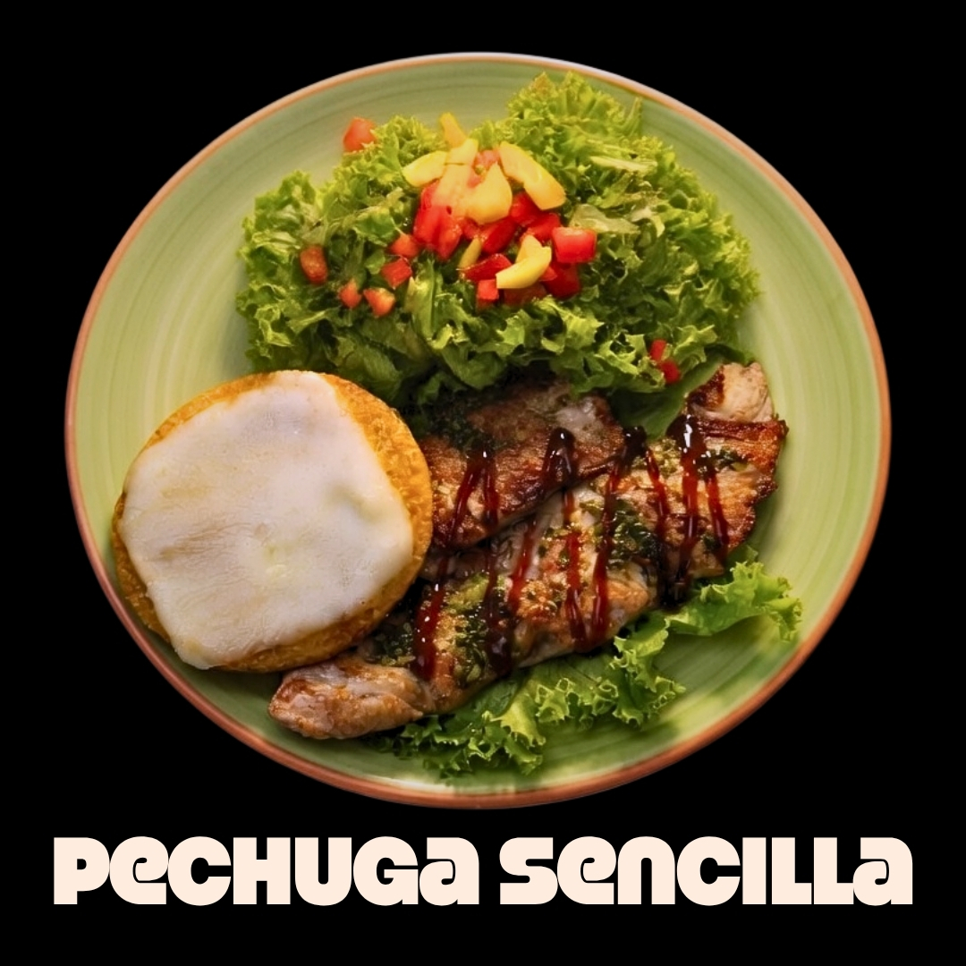 $20.000 | Acompañada de ensalada de lechuga, tomate, mango, y arepa con queso, todo en salsas de la casa. (Sin Papas)